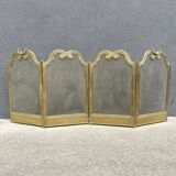 Antique brass fireplace screen from 1920, vintage spark guard.