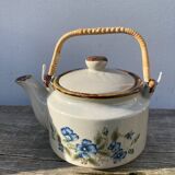 Chinese ceramic and rattan teapot