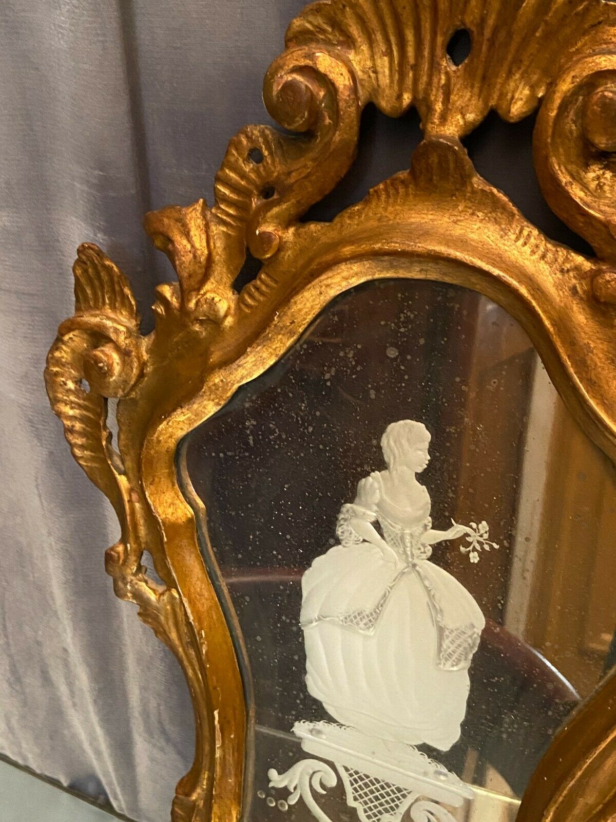 Mirror Rocaille Louis XV gilded wood decorated with a candle display depicting a lady Venice xixth
