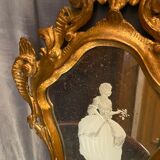 Mirror Rocaille Louis XV gilded wood decorated with a candle display depicting a lady Venice xixth