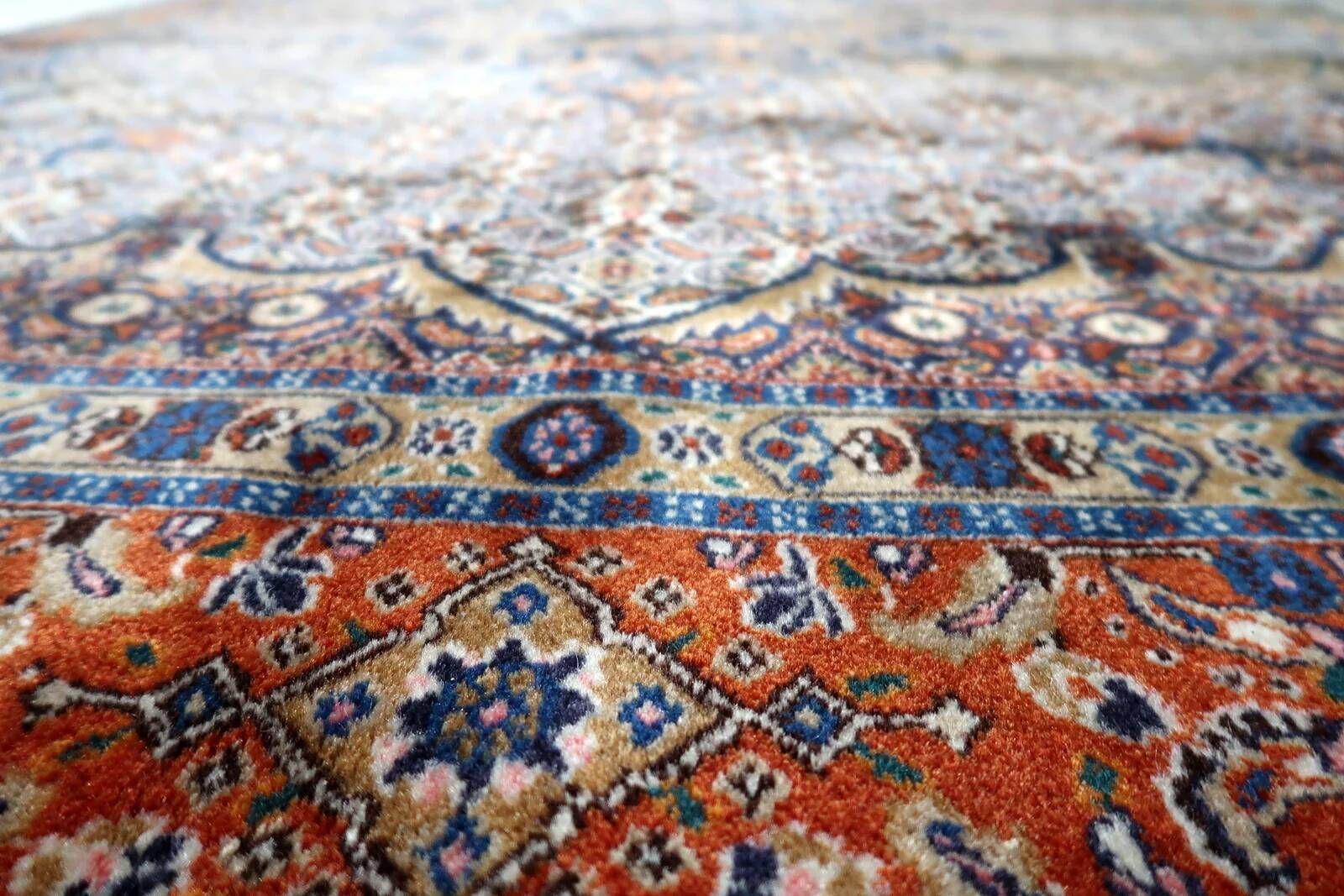 1940s handmade wool medallion rug, ivory and navy, 212 × 312 cm