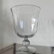 Large Médicis vase in transparent glass on a baluster base.