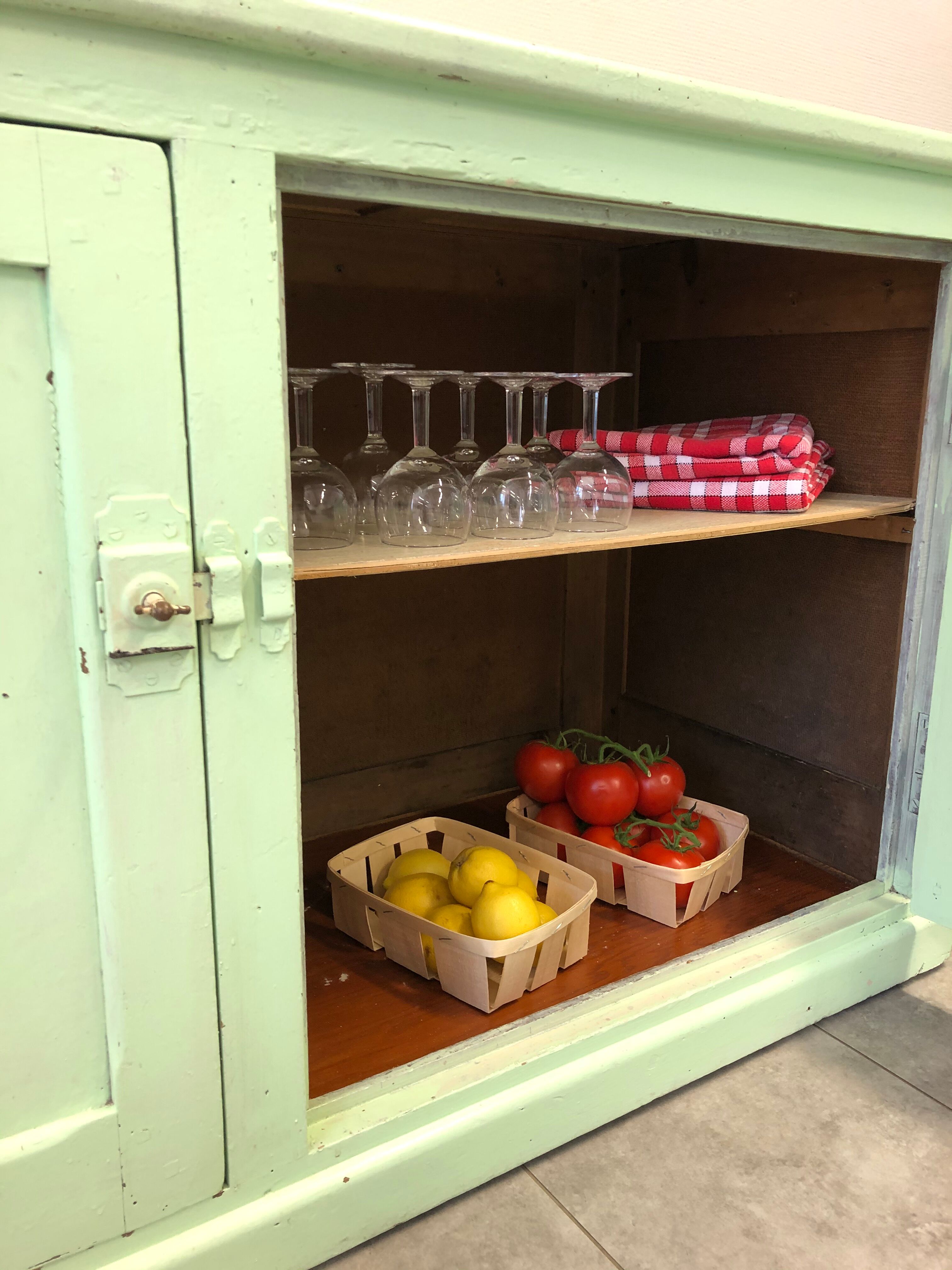 Low green patinated furniture