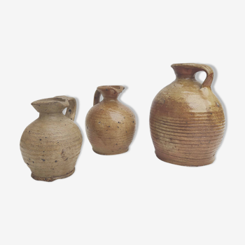 Set of three sandstone pitchers