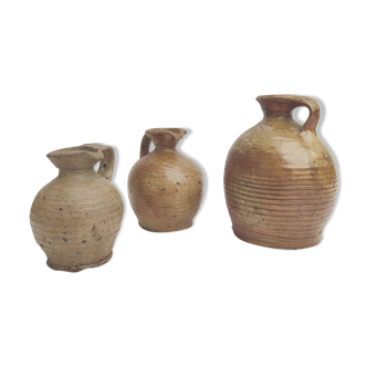 Set of three sandstone pitchers