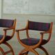 Henning Kjærnulf, pair of oak armchairs, model "Kurul", Danish modern style, 1960s.