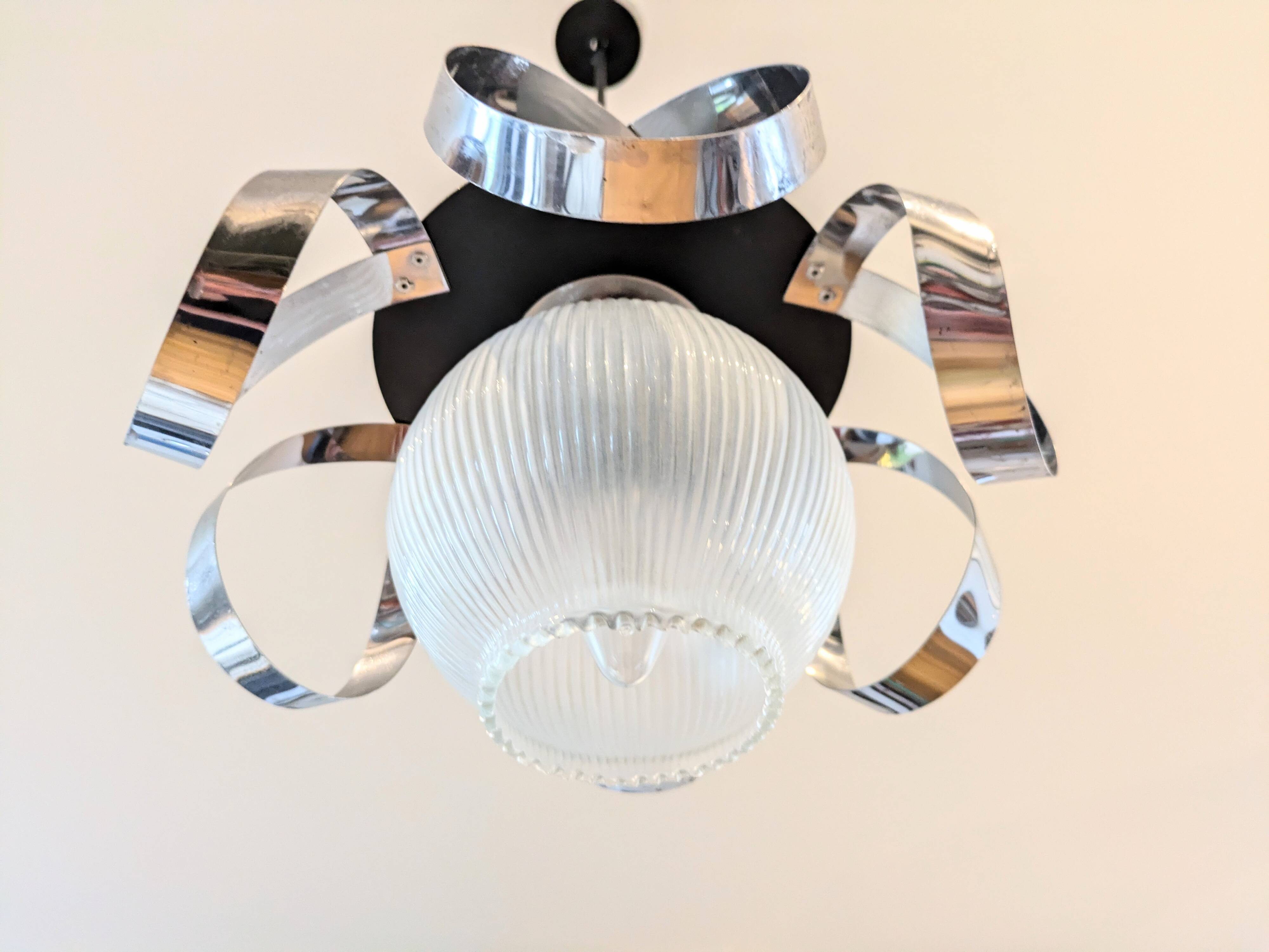 Space Age stainless steel and glass pendant light from the 70s