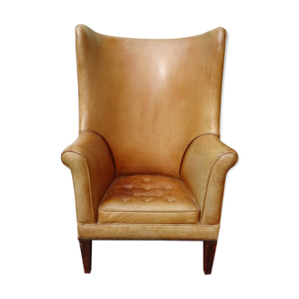 Leather "ear"club armchair