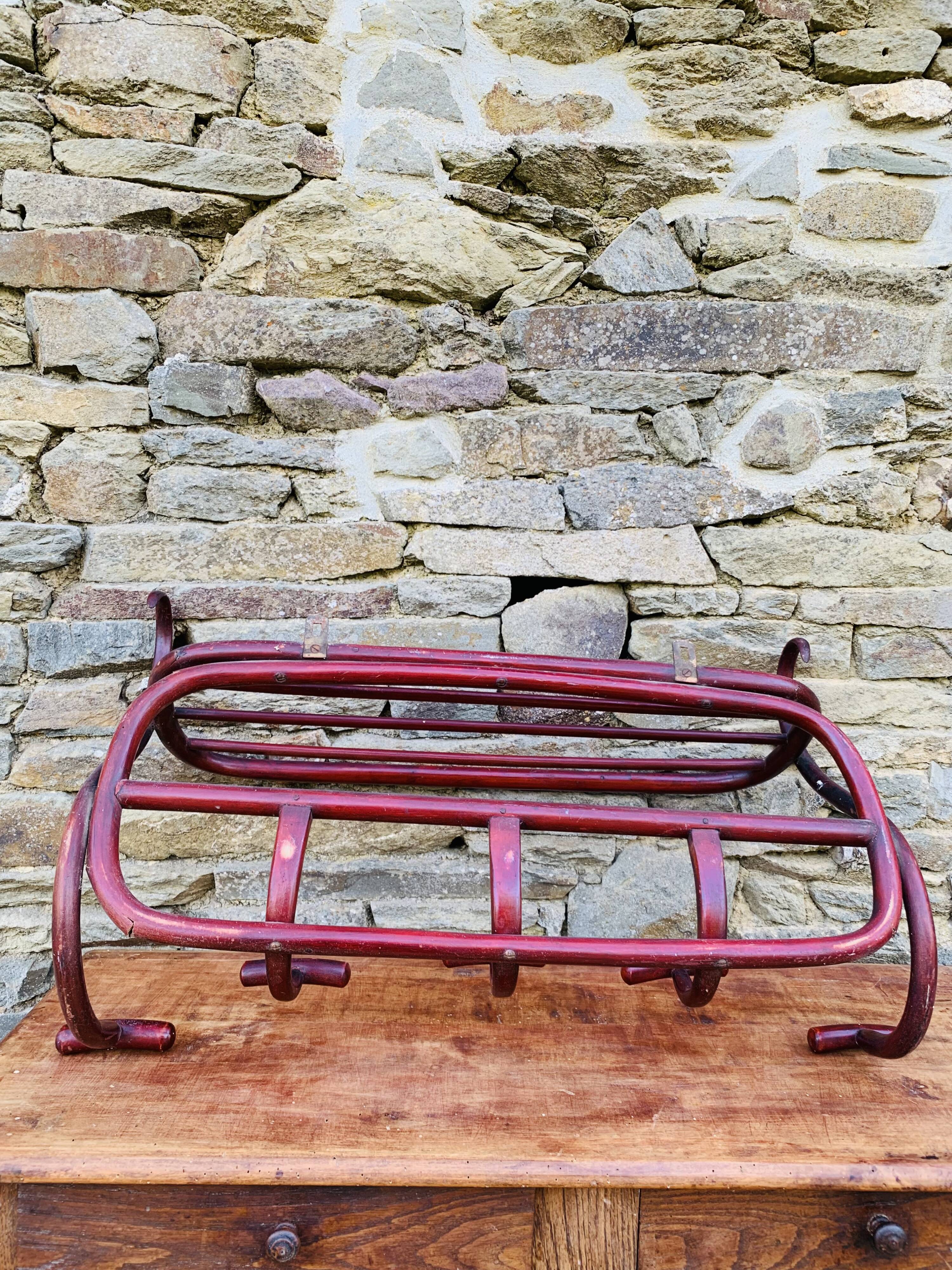 Antique curved wooden wall coat rack
