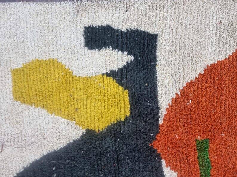 Handmade traditional Moroccan rug with colourful patterns, size 140x260 cm.