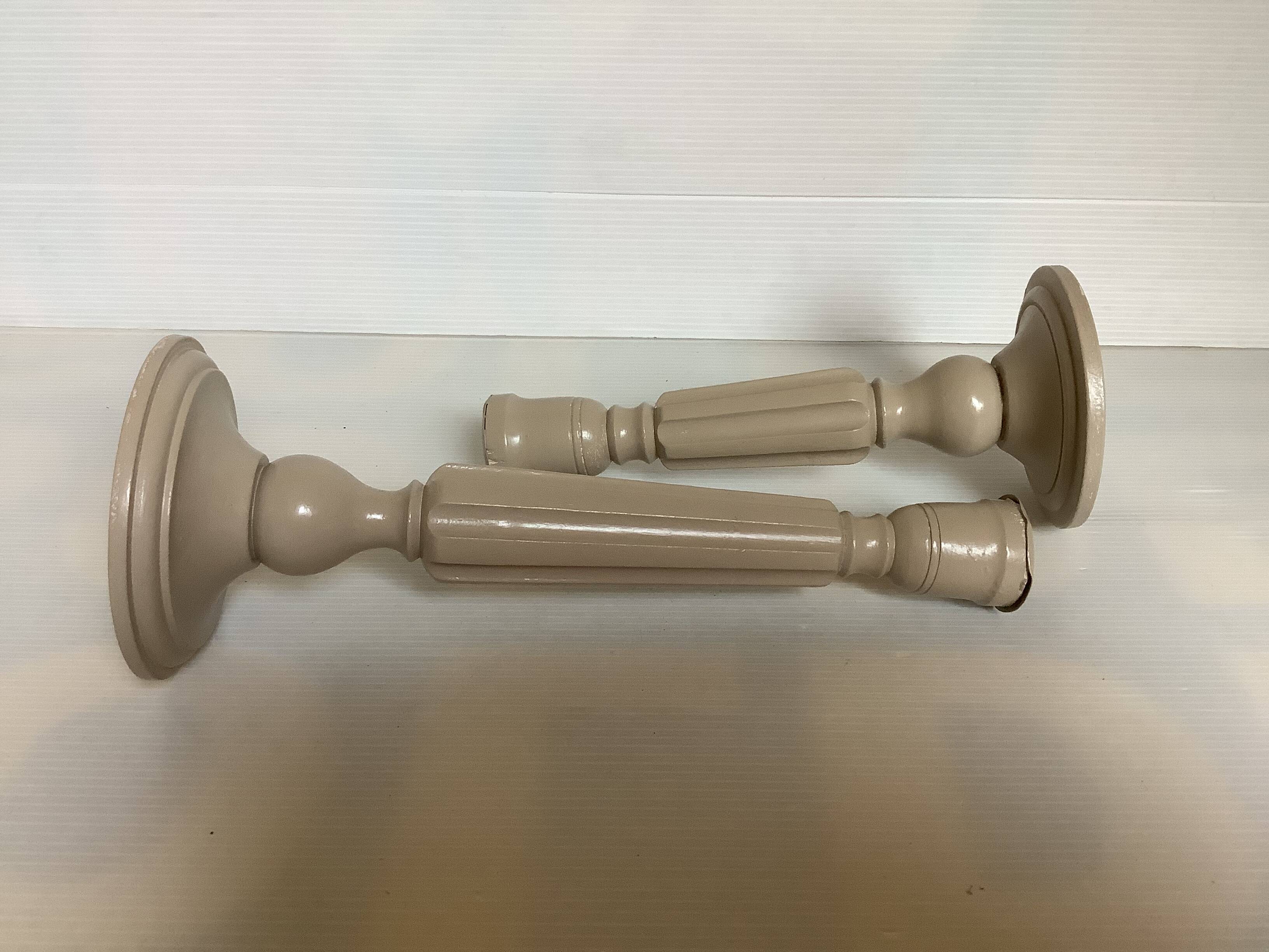 Pair of painted wooden candlesticks