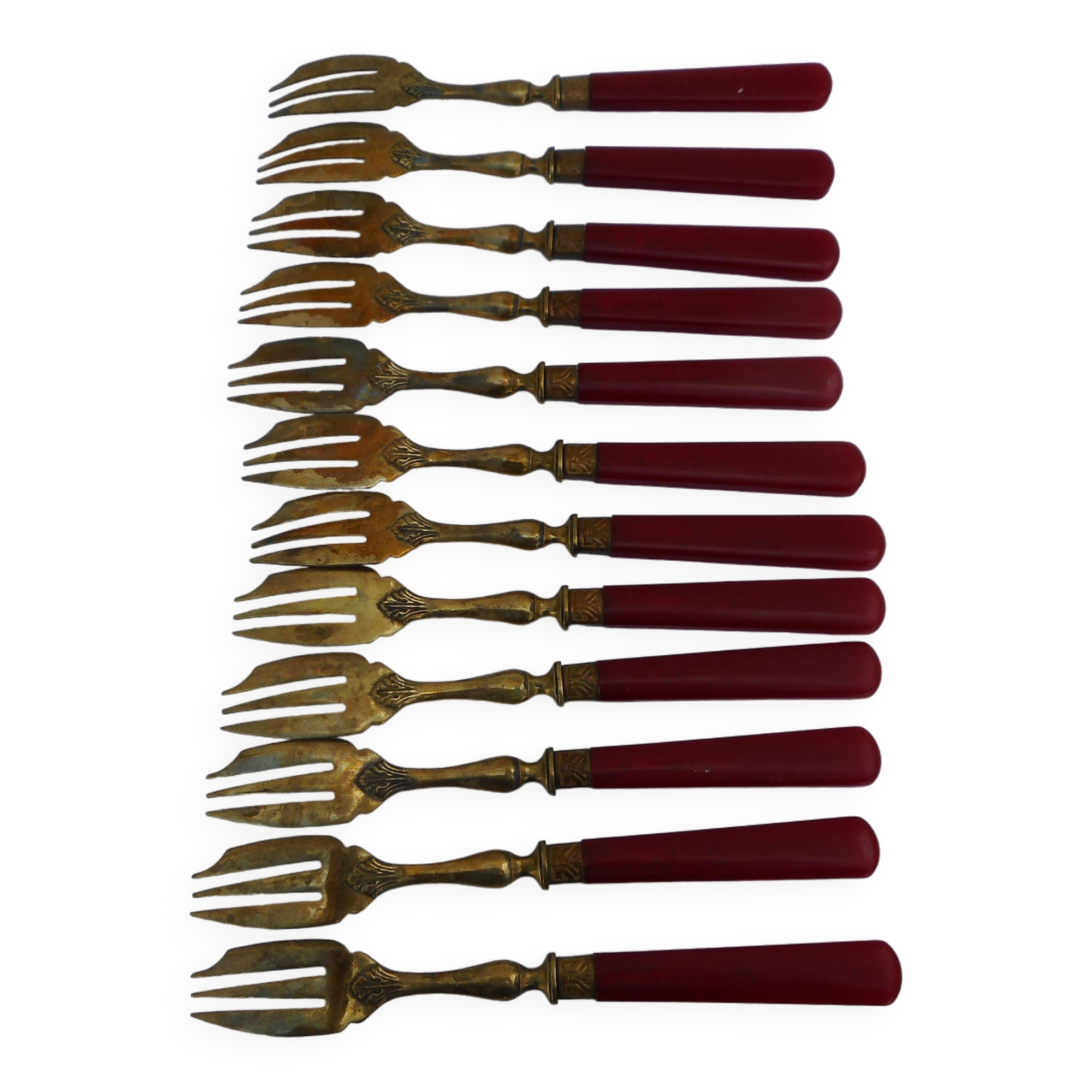 Twelve bakelite handle cake forks