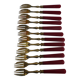 Twelve bakelite handle cake forks