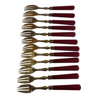 Twelve bakelite handle cake forks