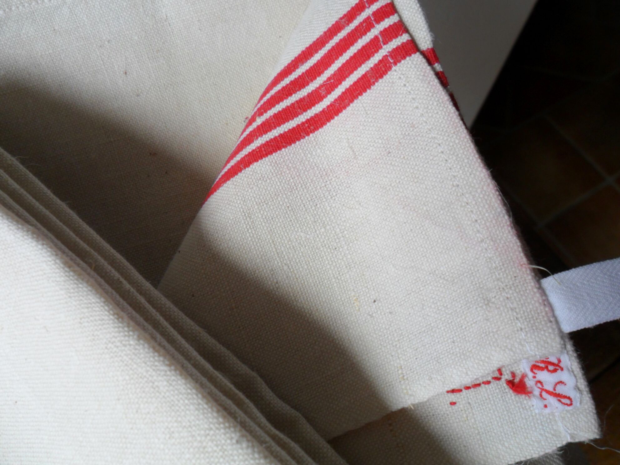 Set of 6 antique tea towels lined with ml