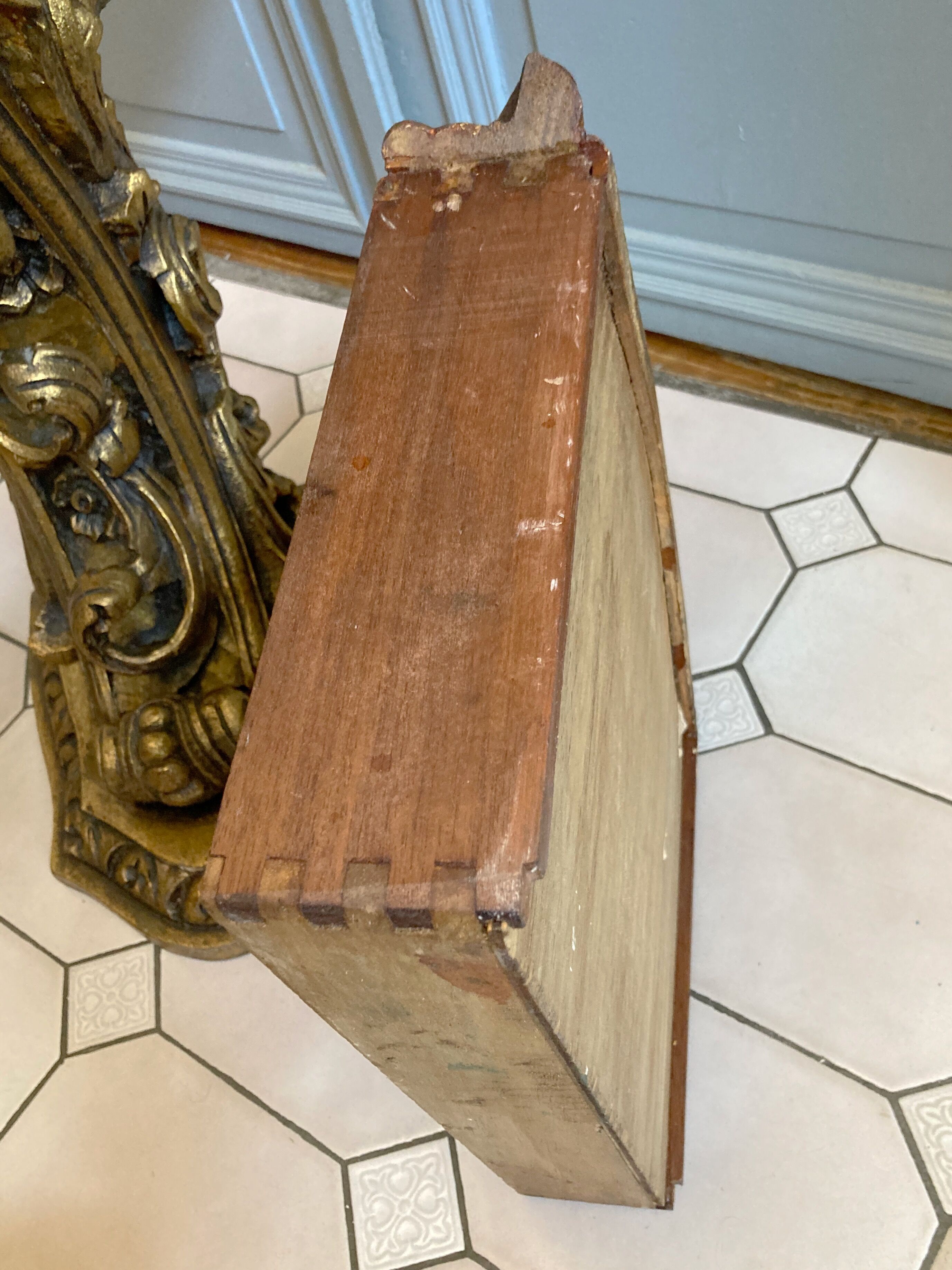 Carved wooden and marble console