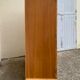 Rattan wardrobe with tapered legs from the 1960s.