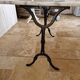 Bistro table with marble top and cast iron legs