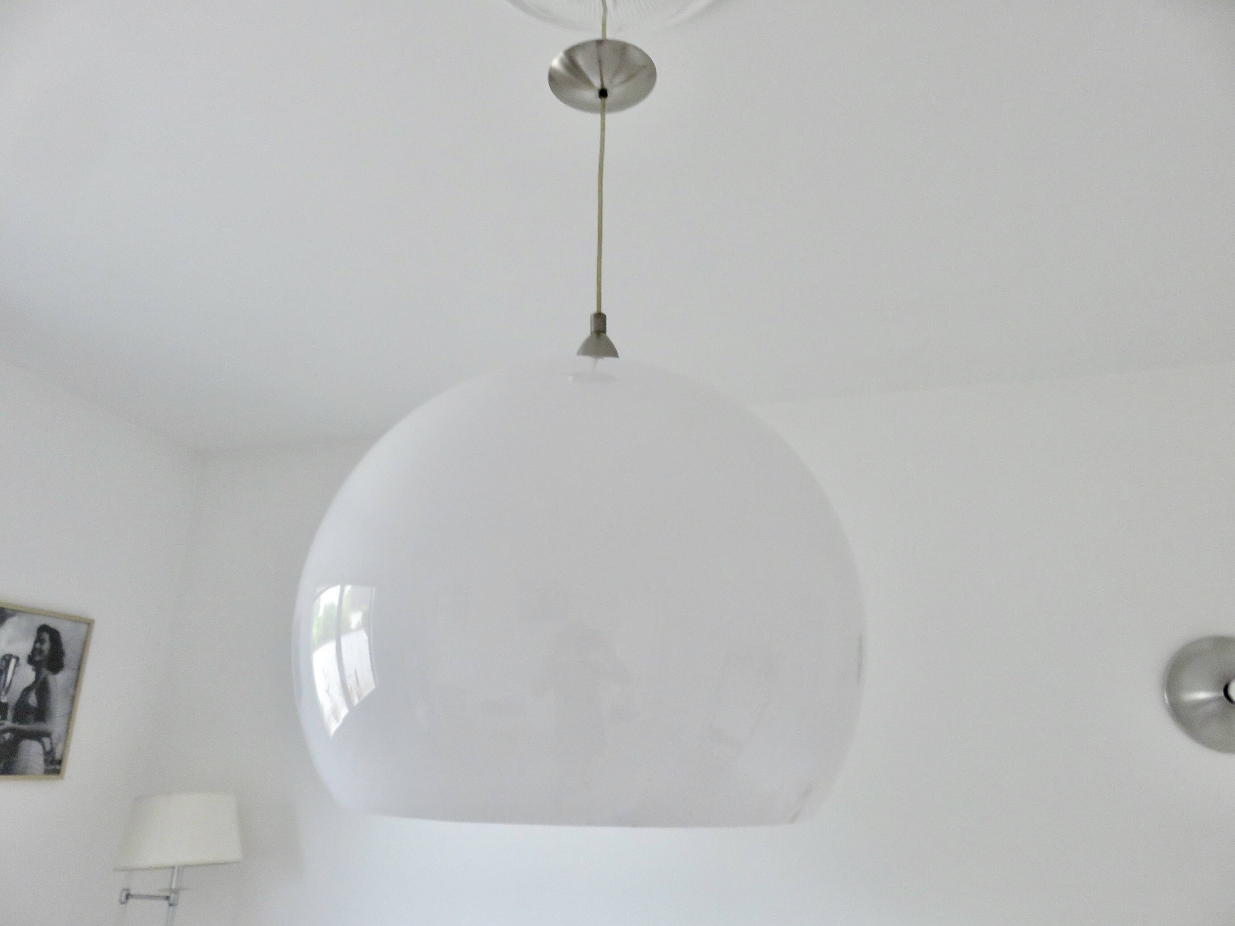 Large spherical suspension in perspex from the 1990s.