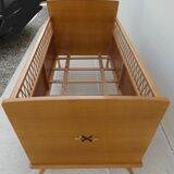 Art Deco baby with its wooden compass feet