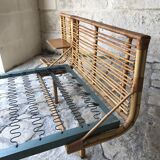 Twin rattan beds with built-in bedside tables