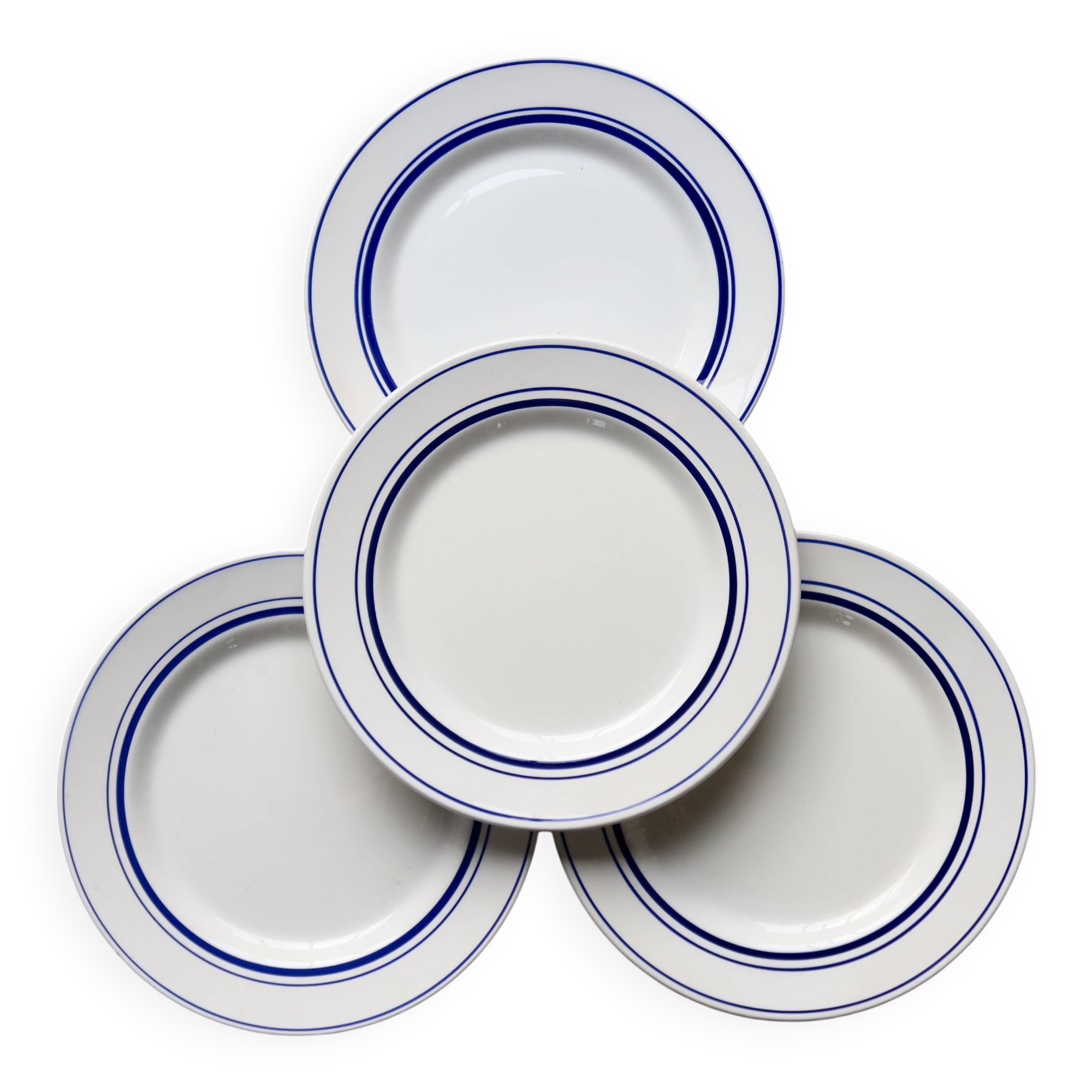 4 vintage bistro style flat plates in blue and white porcelain