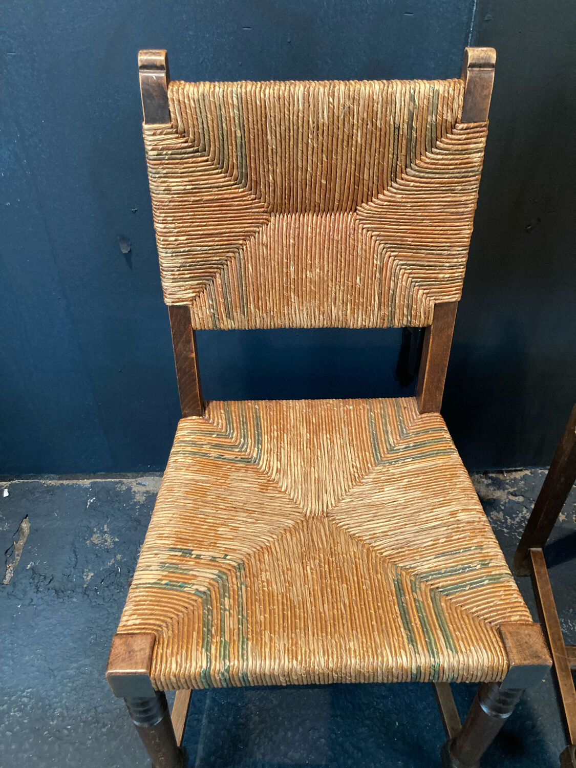 Four straw chairs