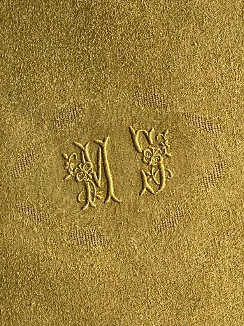 Old linen tablecloth and evening tinted in vermeil