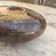 Flattened spherical vase made of glass paste