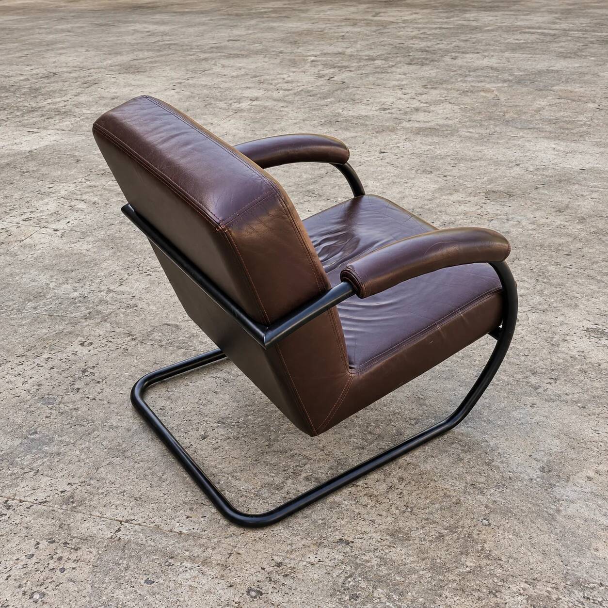 2 x dark brown / bordeaux red / weighty leather club chairs / 1980s