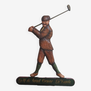 Large carved wooden golfer