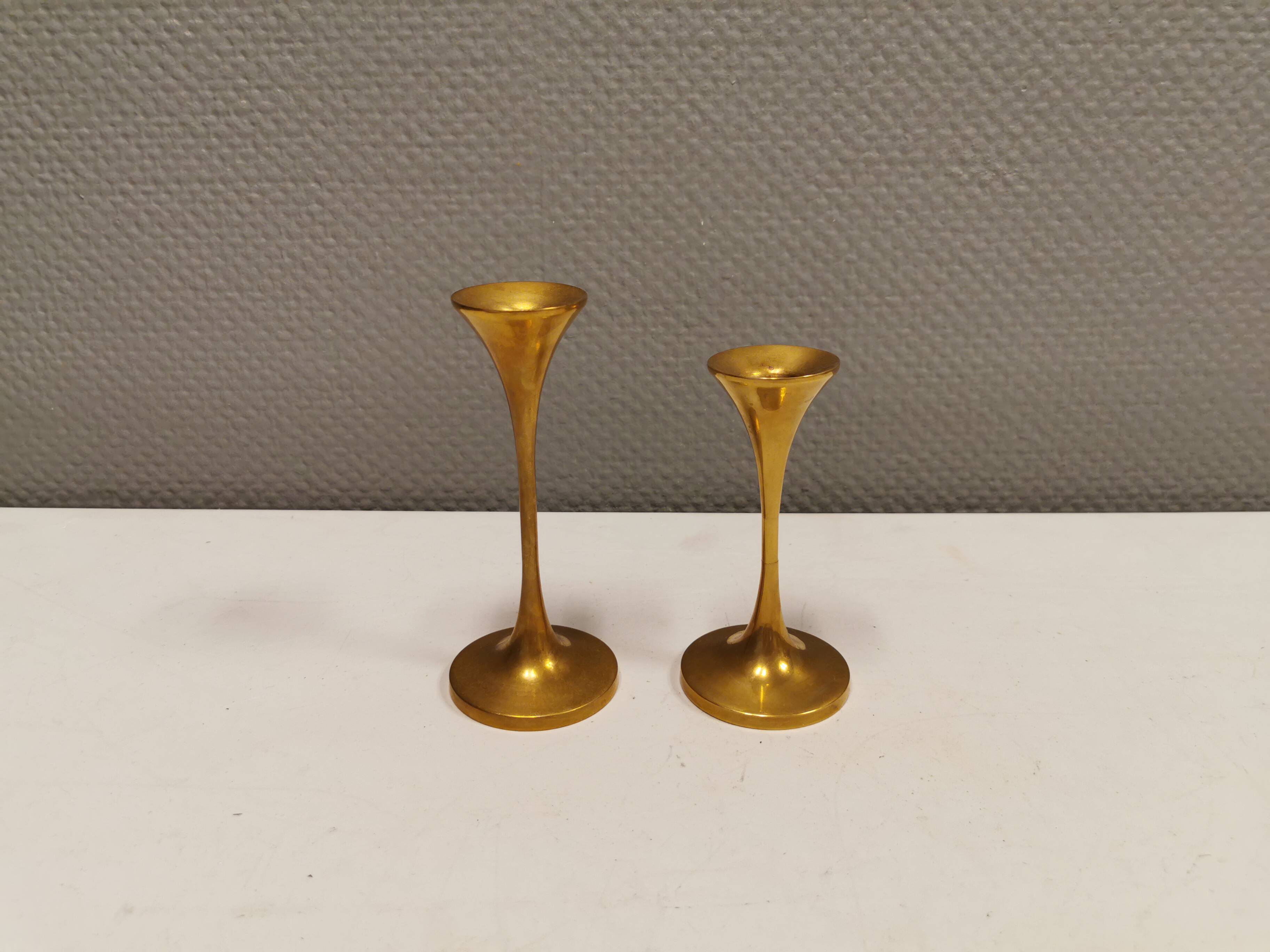 A set of candle sticks, in solid brass, made by Malm Denmark in the 1960s