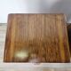 Art Decò walnut bedside tables with door and drawer