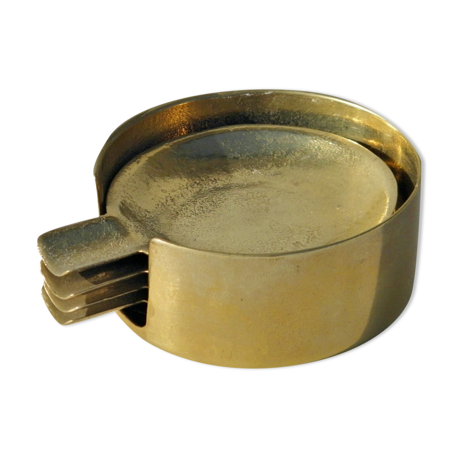 4 brass ashtrays in their 1970 case