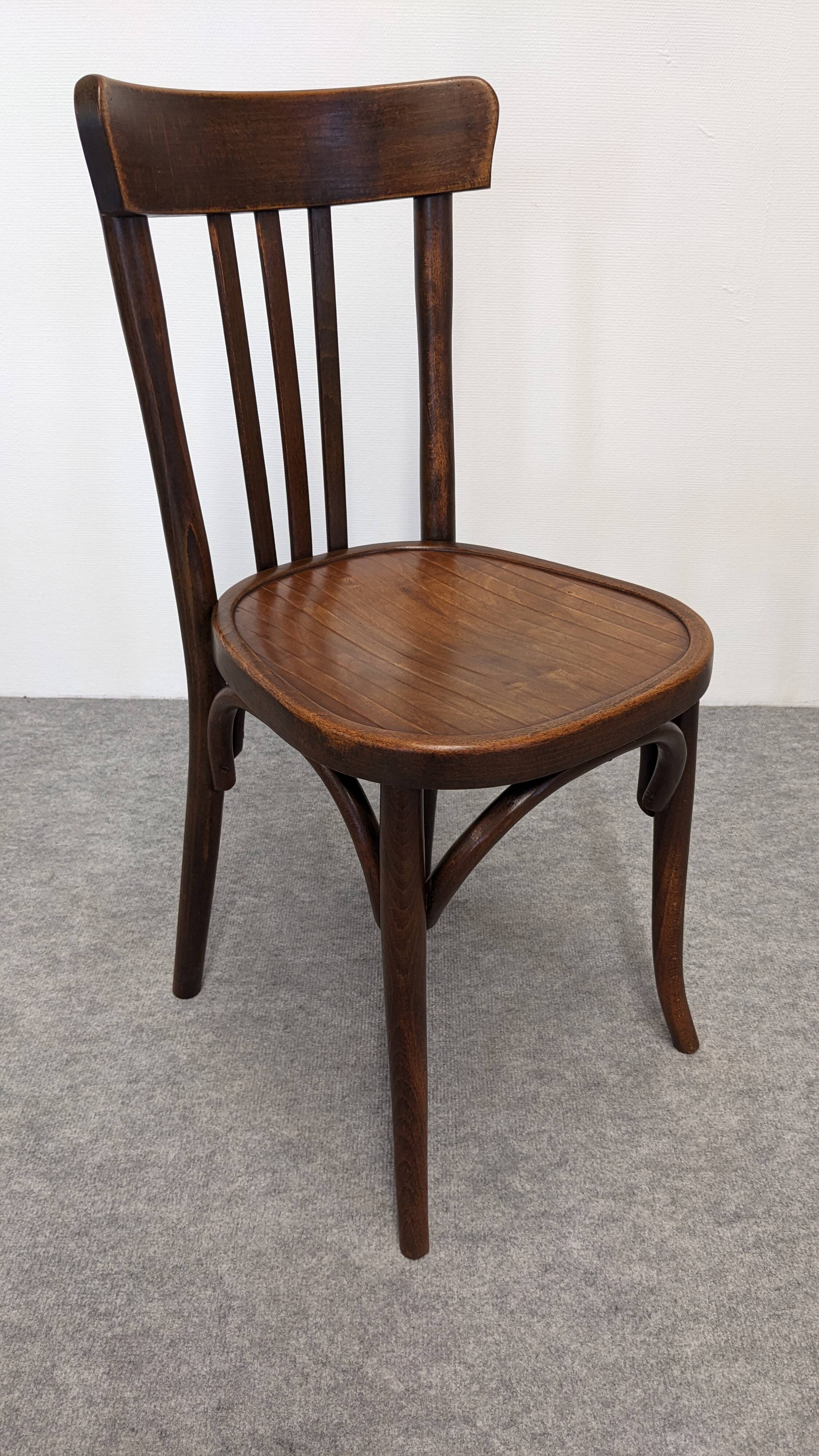 Set of 8 Baumann bistro chairs in bent beech, France circa 1930.