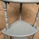 Antique corner shelf on legs