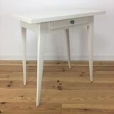 White wood desk foot compass