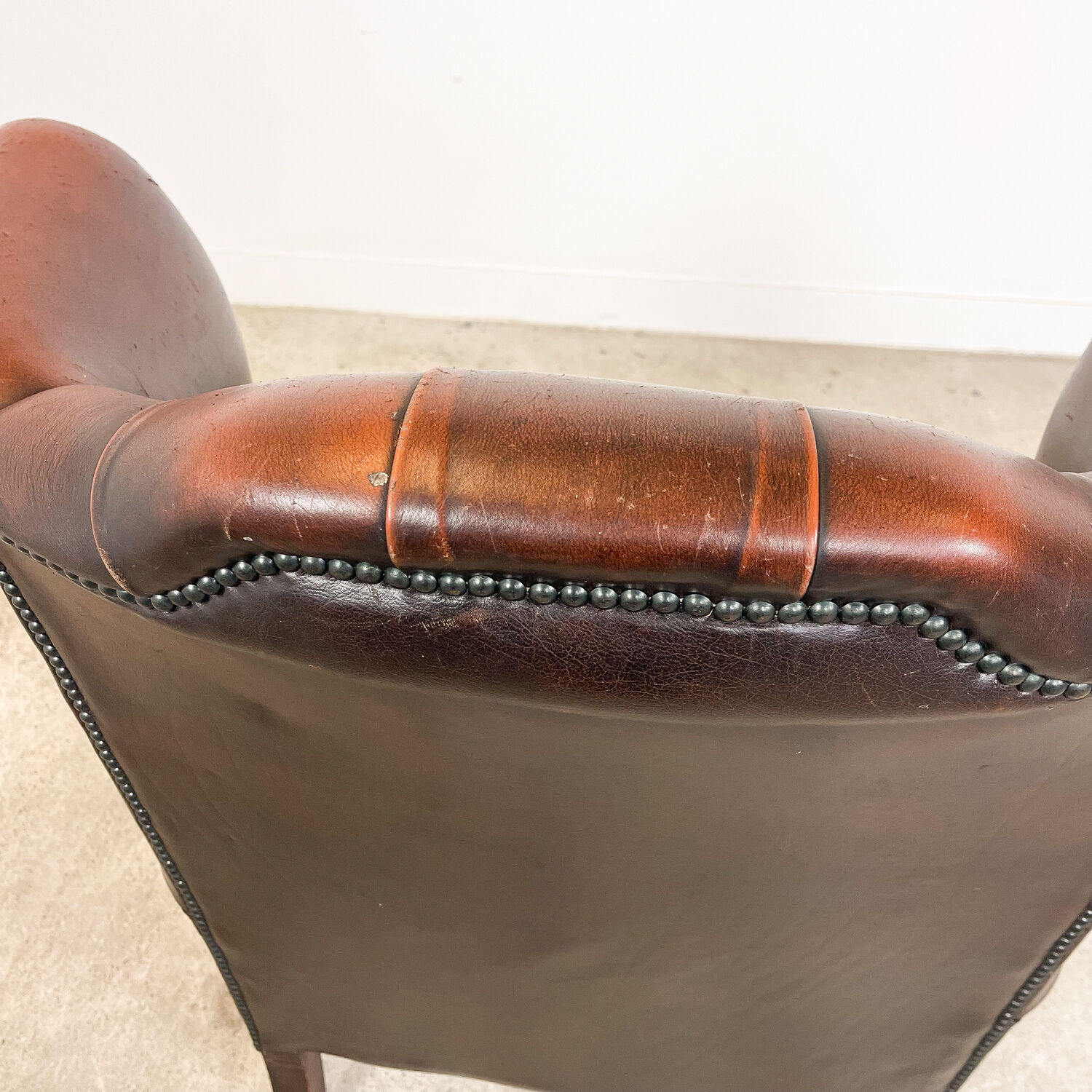 Vintage rustic dark brown leather chesterfield wingback armchair wassenaar
