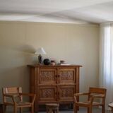 Tage Poulsen, a pair of brutalist chairs in pine and cord, Danish modern style, 1970s.