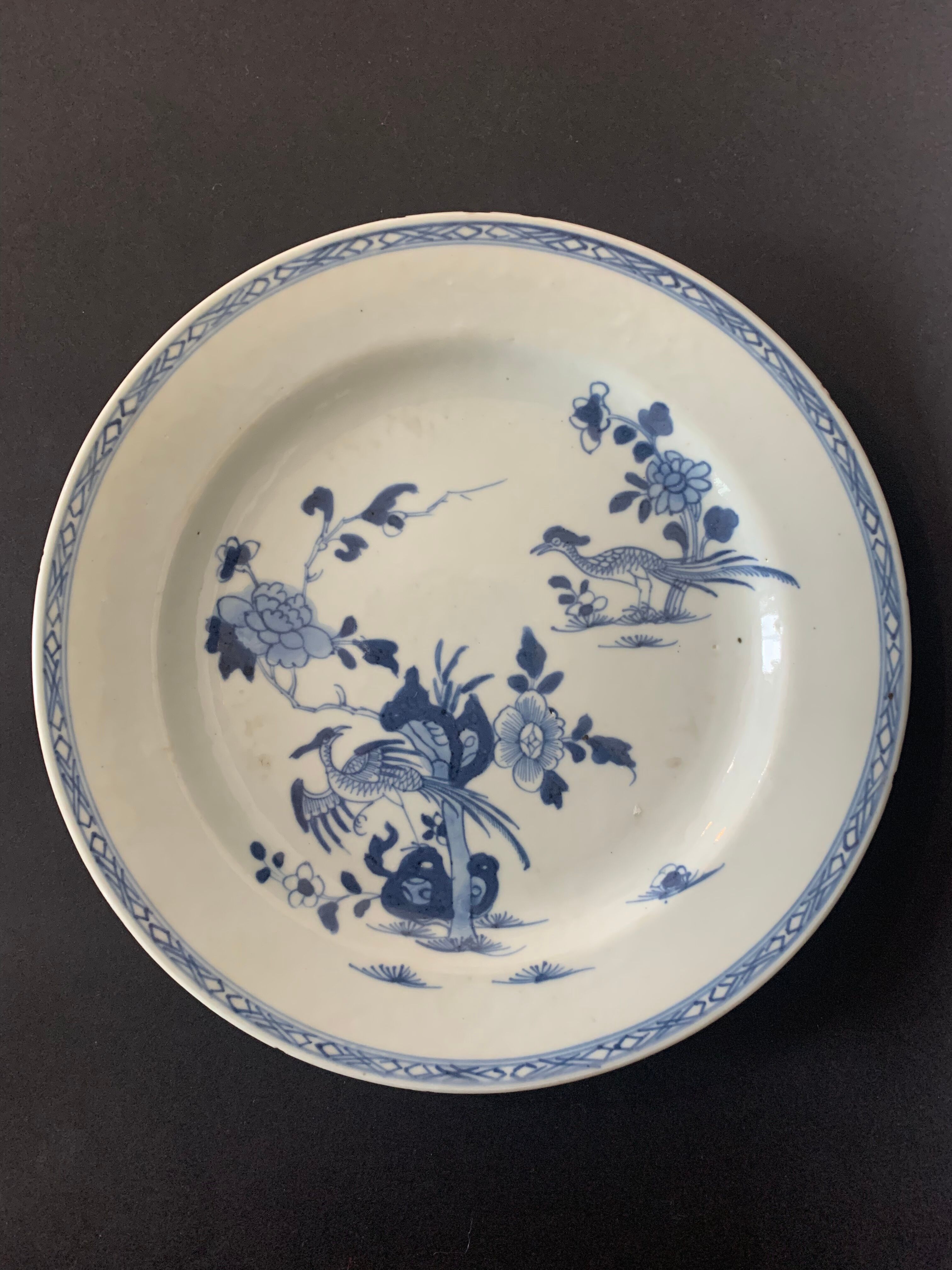 Blue and white porcelain plate of the blue family, 19th century