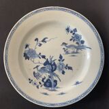 Blue and white porcelain plate of the blue family, 19th century