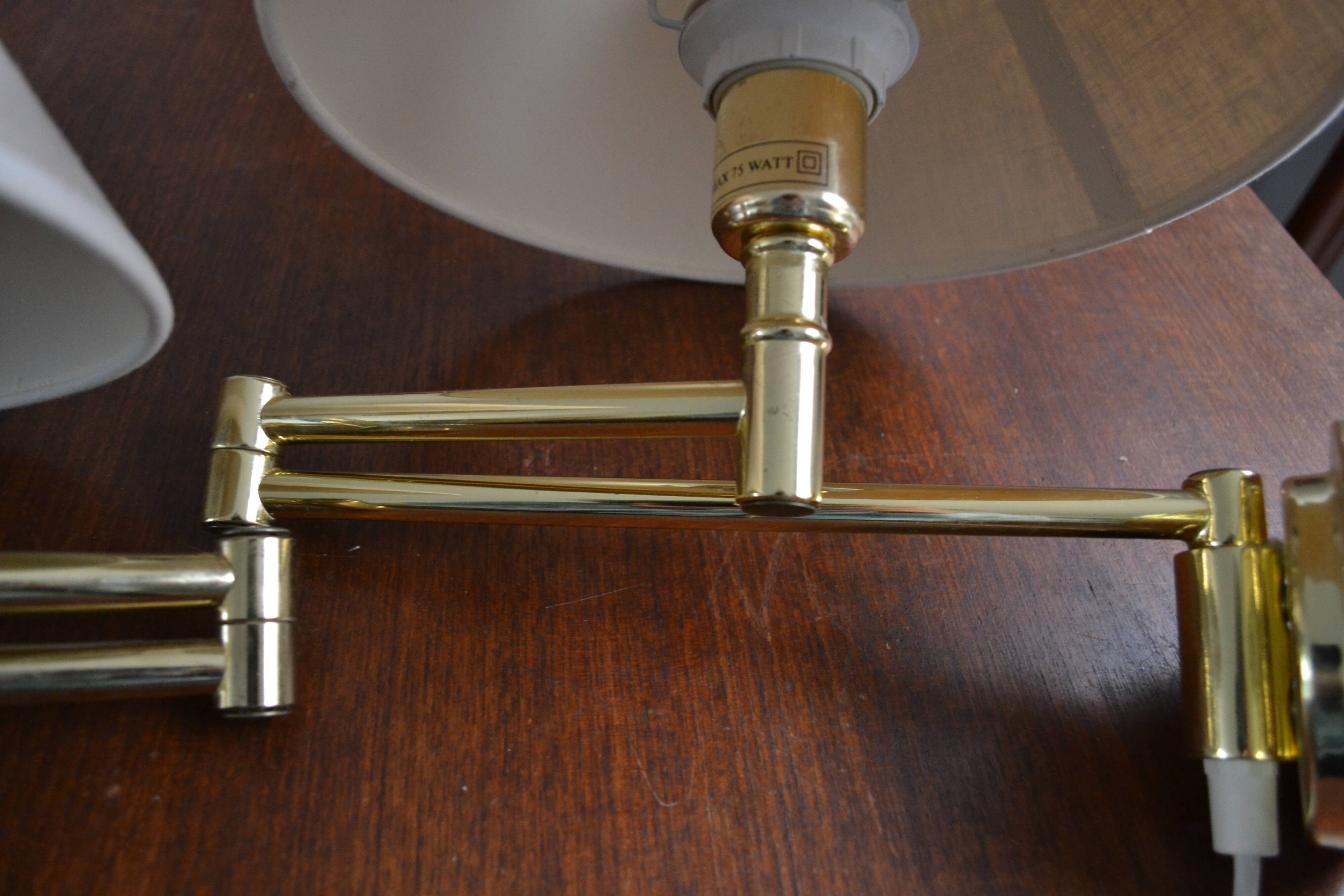 Pair of vintage gold articulated sconces
