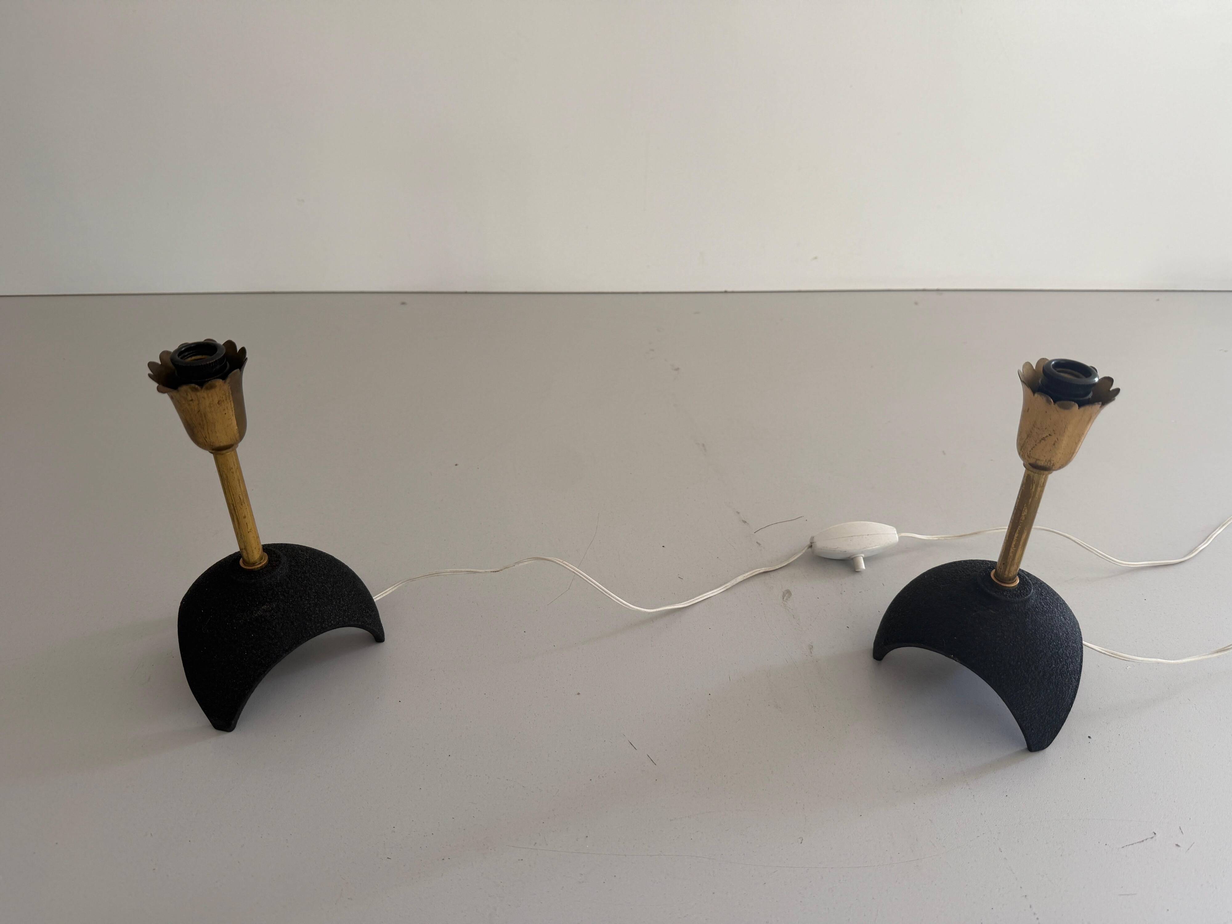 Pair of mid-century bedside lamps in brass and black metal, 1960, Italy