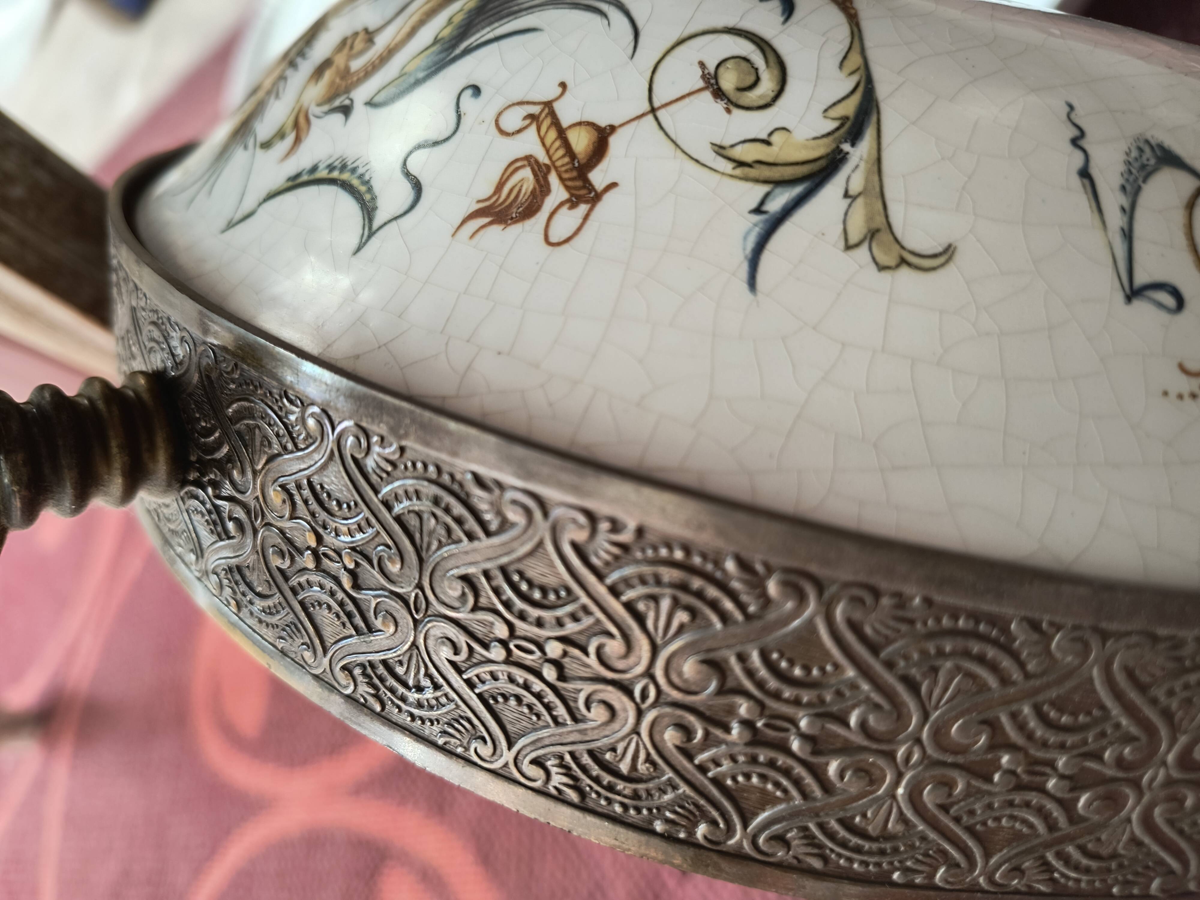Lustrous bronze, copper and gien-style earthenware.