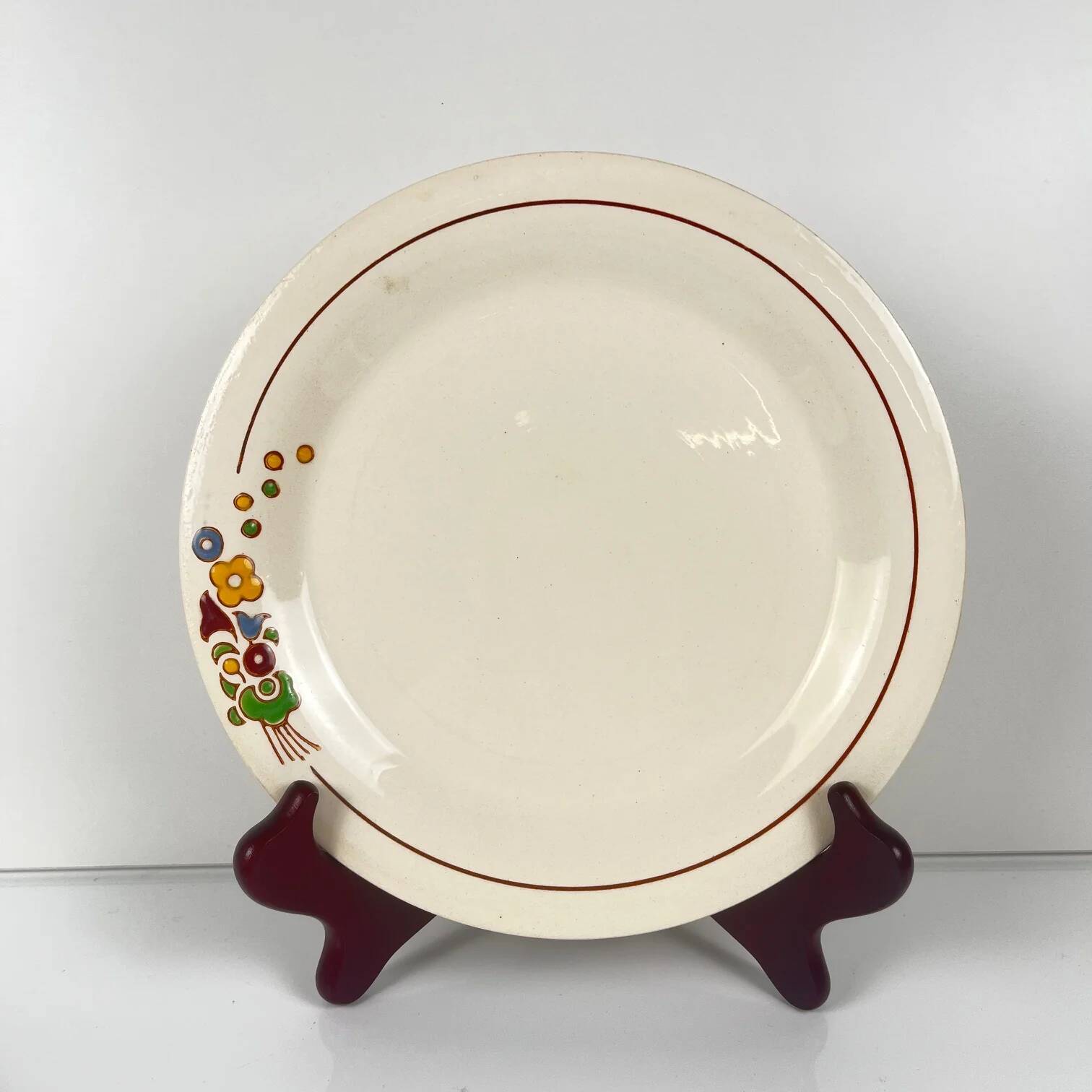 Set of 5 dessert plates Longwy, early 20th century, floral decoration.
