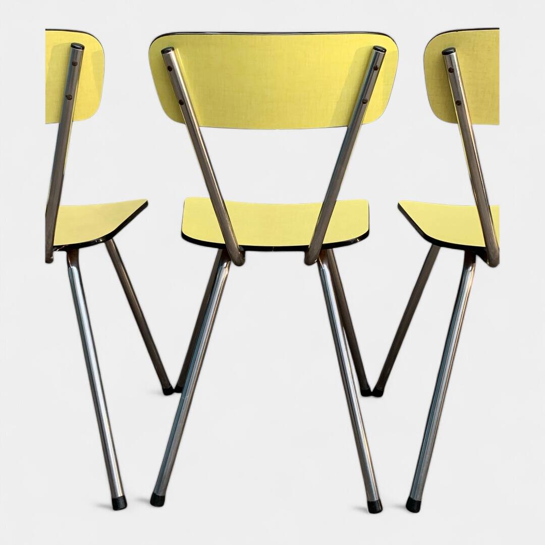 Yellow Formica chairs with compass legs, 1950s