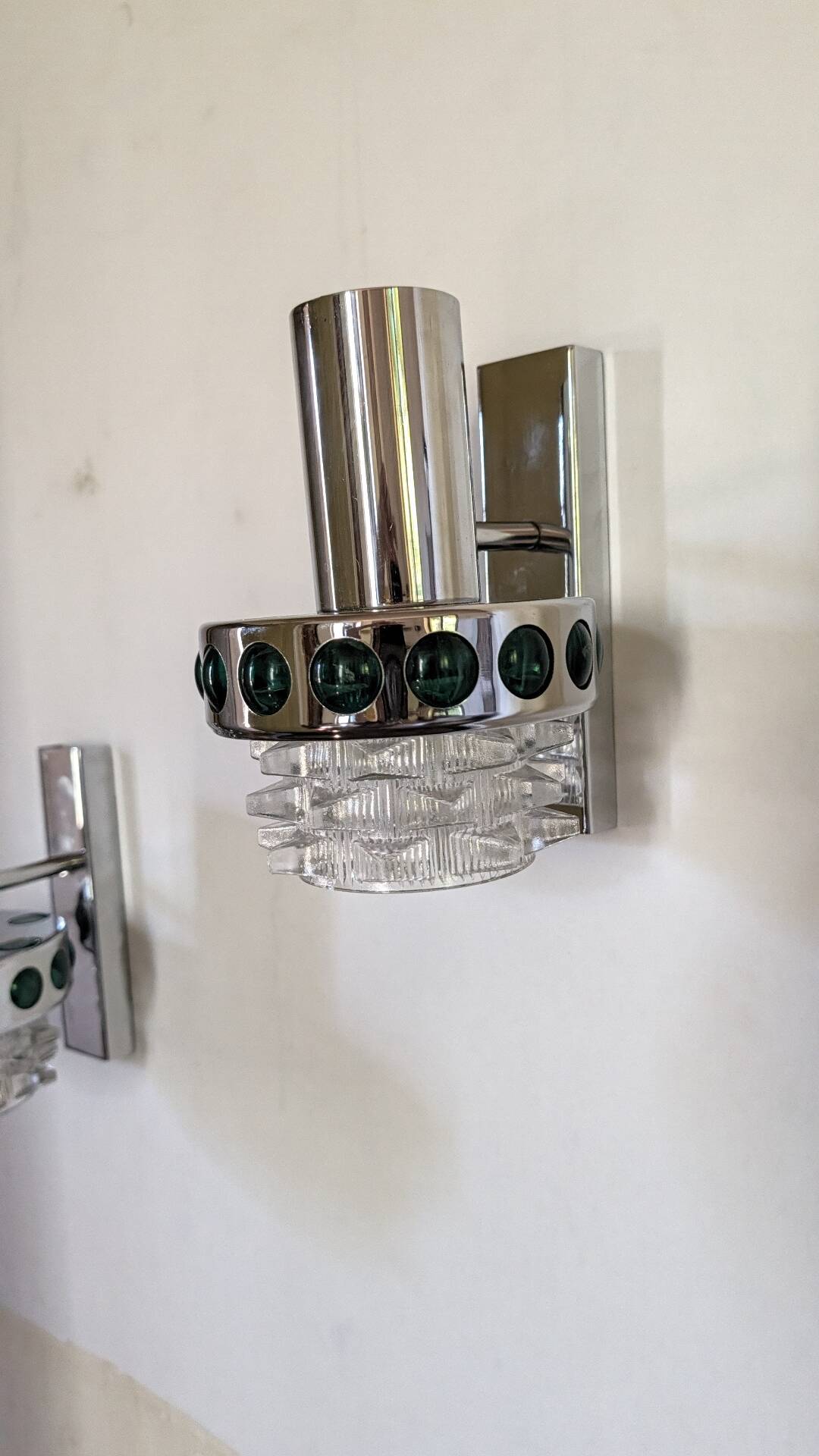 Pair of Space Age wall lights in chrome and green glass, 1970s.
