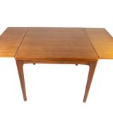 Dining table with extentions in teak designed by Henning Kjærnulf from the 1960s.