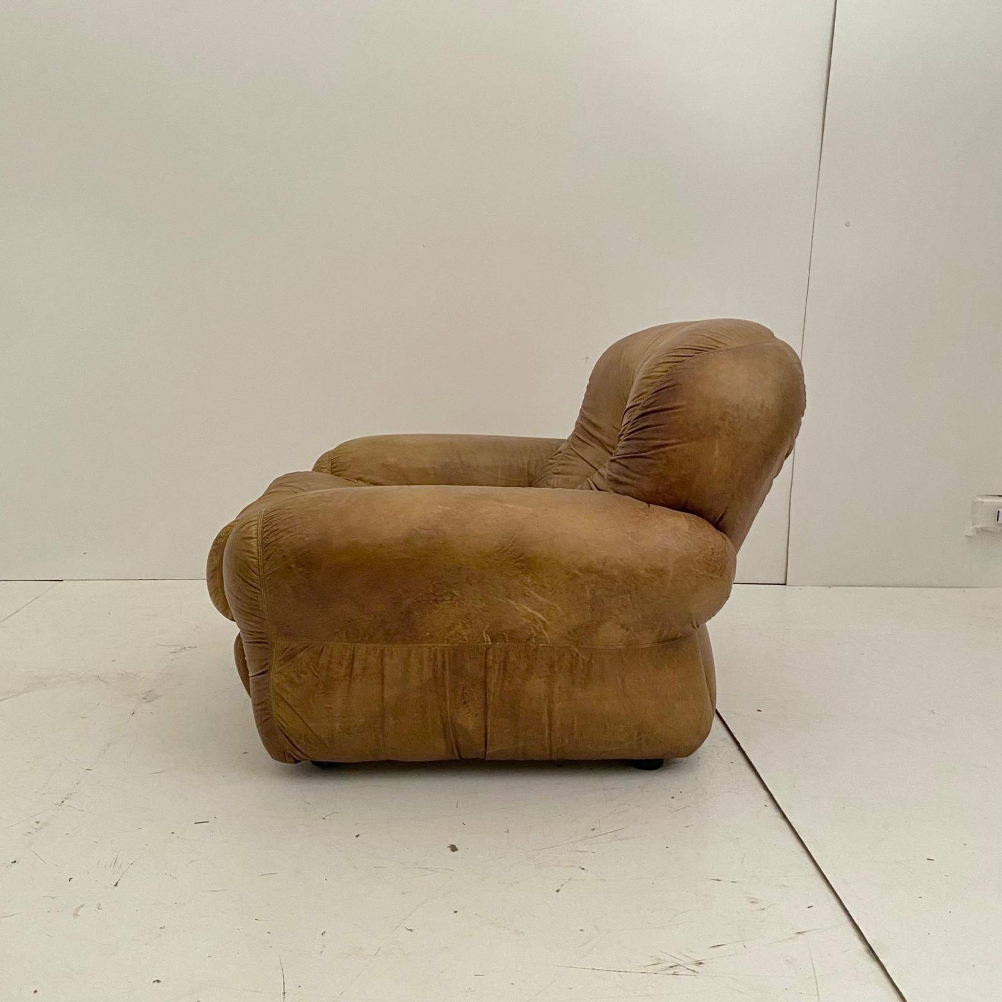 Pair of brown leather armchairs