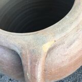 Old jug with two sandstone handles